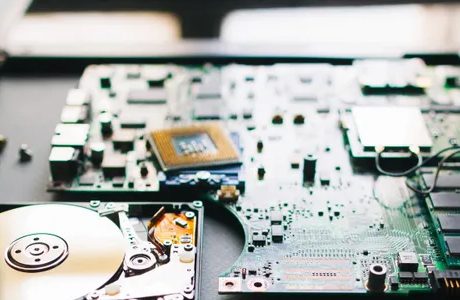 A close up of the electronics on top of a table.